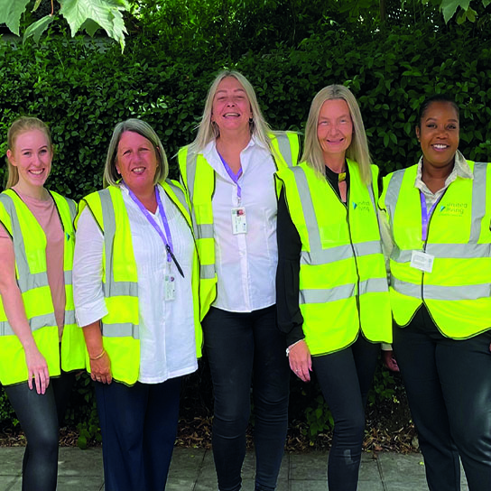 group of united living employees