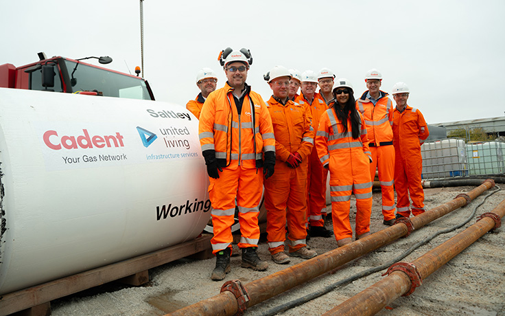 construction workers posing with Saltley Viaduct pipe