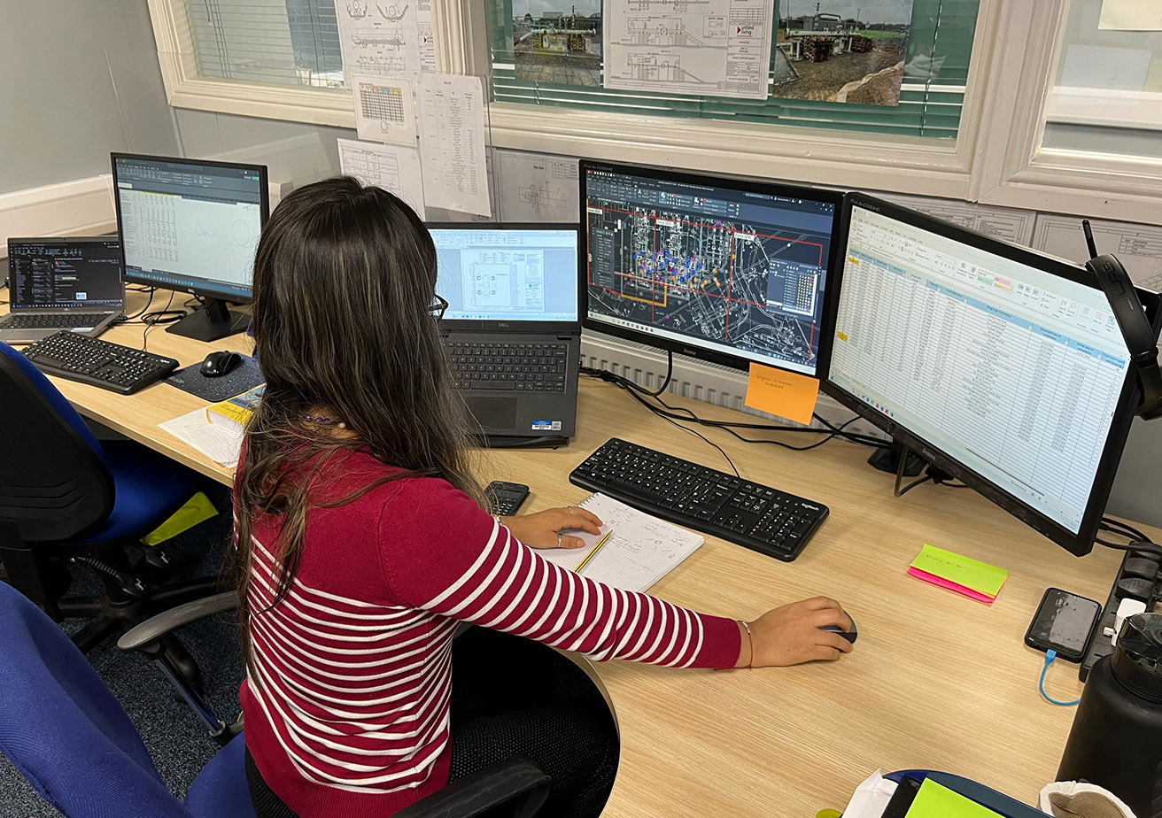 employee working on water designs