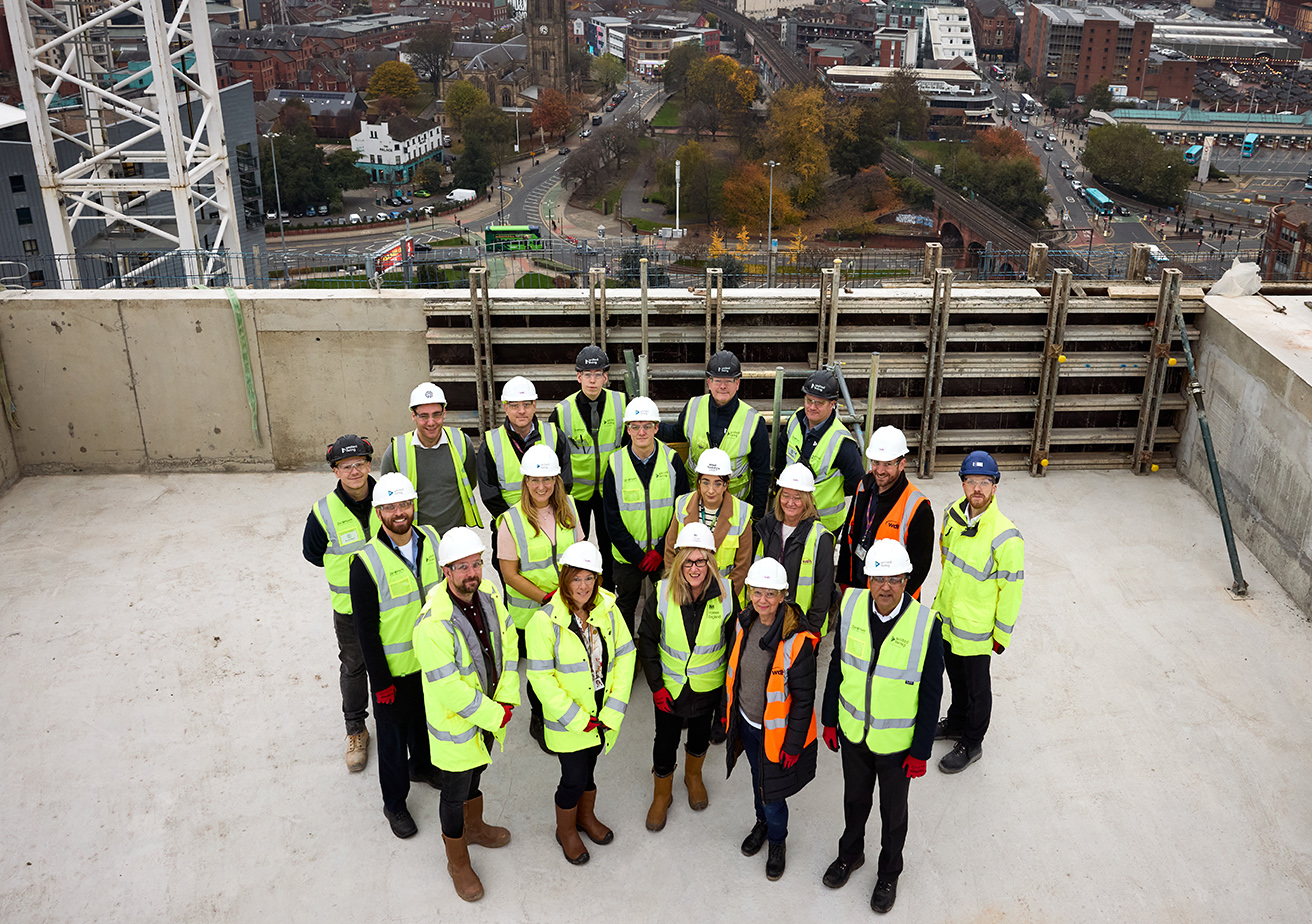 construction workers at topping out ceremony